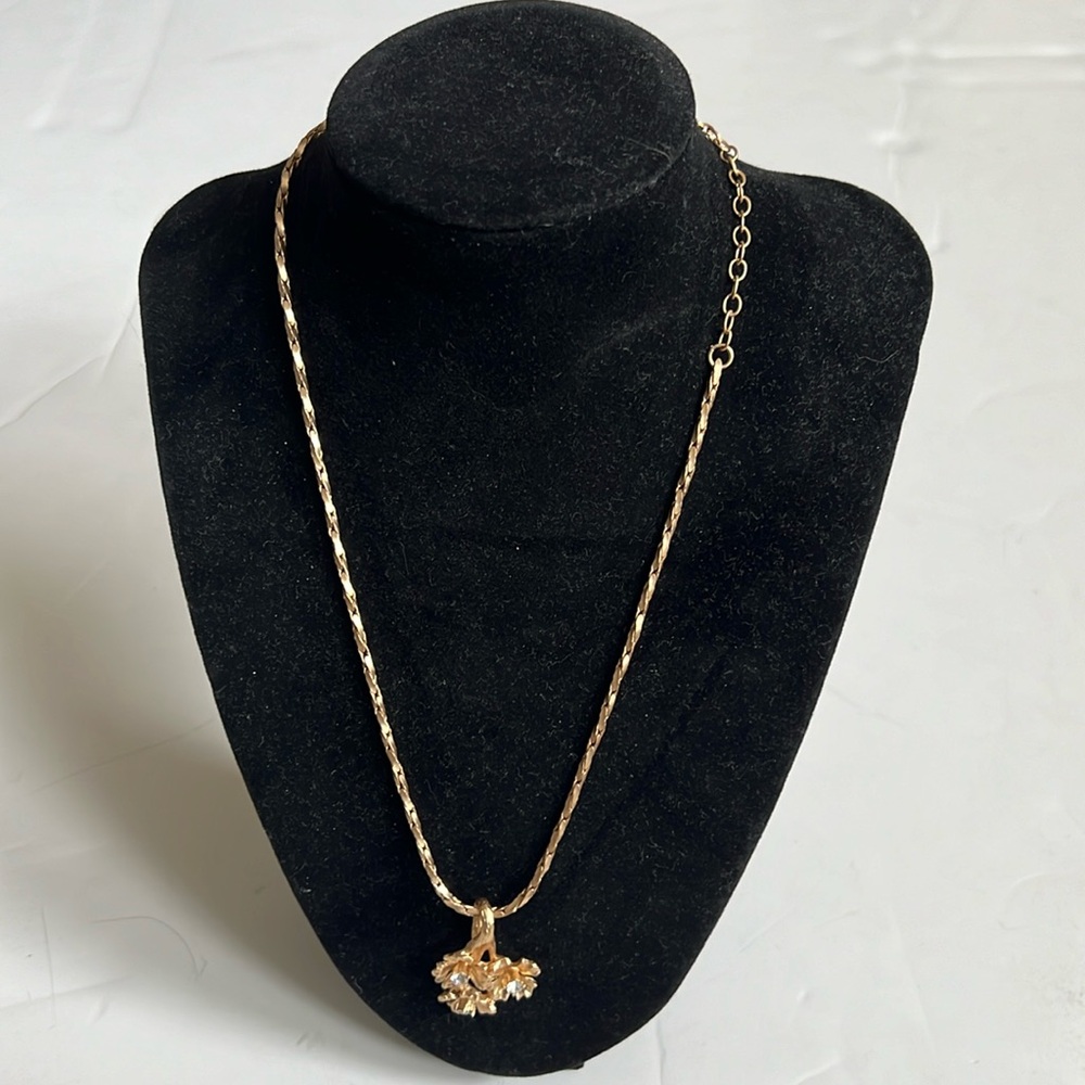 Bella Gold Tone Chain Necklace With A Floral Pendant With Rhinestone Centers